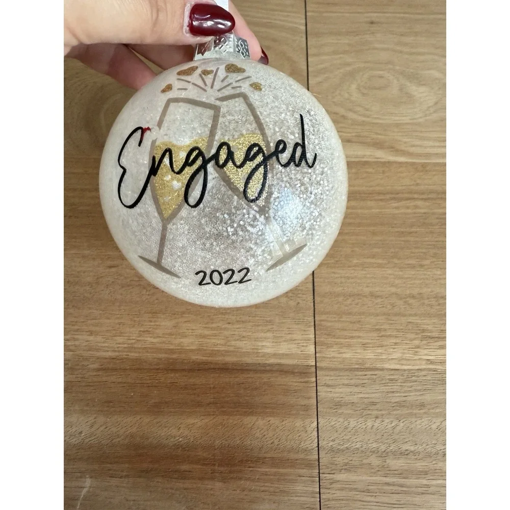 Engaged 2022 Christmas Ornament – Glitter Glass Ball with Champagne Toast Design